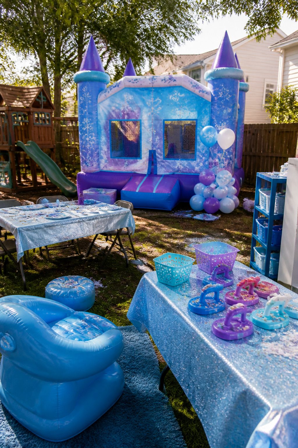 Frozen Themed Birthday Party: Your Complete 2026 Guide 9 A Frozen bounce house set up in a playful party environment.