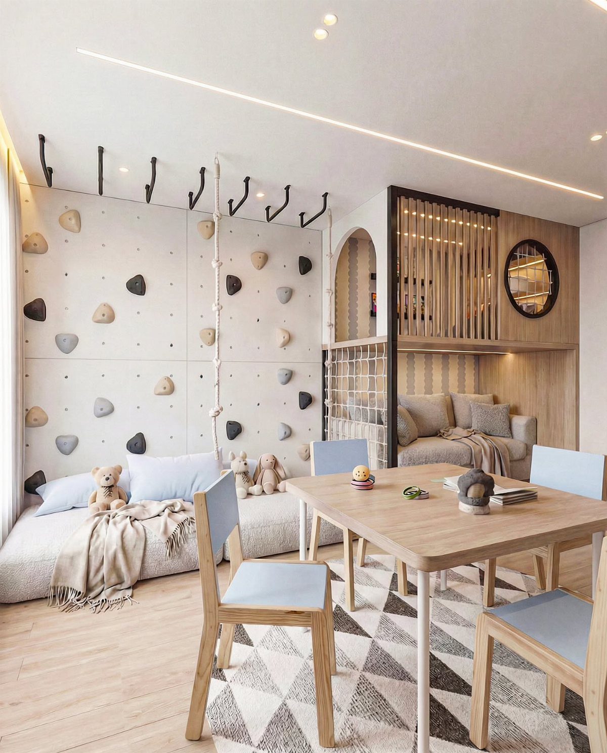 23 Small Playroom Design Ideas That Fit Real Rooms 5 A modern playroom with a climbing wall, built-in sofa nook, and a wooden dining table.